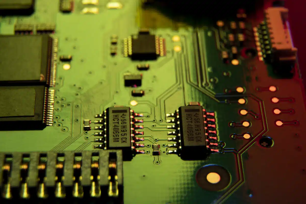 Illustrative close-up of chip packages and traces on a circuit board